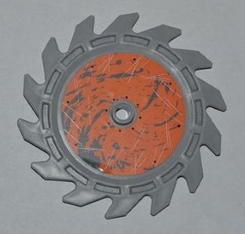 Lego Technic Circular Saw Blade 9 x 9 with Pin Hole and Teeth in Same Direction with Splatter and Scratches on Orange Background Inside Pattern (Sticker) - Sets 8708 / 8963