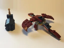 31102 Dragon with Building