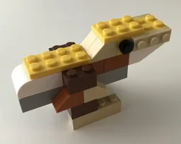 10696 Tan dinosaur