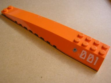 Lego Wedge 16 x 4 Triple Curved with Reinforcements with Bullet Hole and '001' on Left Side Pattern (Sticker) - Set 7705