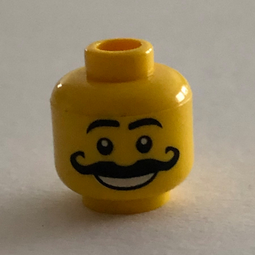 Lego Minifig Head, Moustache Curly Long Thick, White Grin, Raised Eyebrows Print [Blocked Open Stud] / Yellow