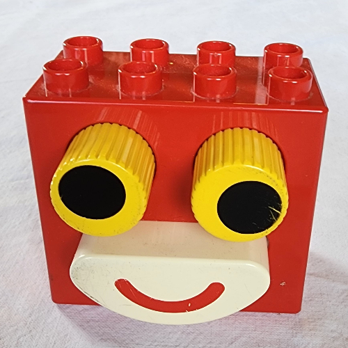 Lego Duplo Brick 2 x 4 x 2 with Black in Yellow Eyes and White Mouth / Red