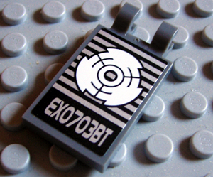 Lego Tile, Modified 2 x 3 with 2 U Clips with Target and Silver 'EXO703BT' Pattern (Sticker) - Set 8113