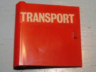 Lego Door 1 x 5 x 4 Left with White 'TRANSPORT' on Red Background Pattern (Sticker) - Set 725-2
