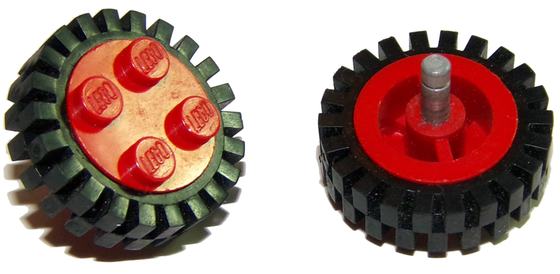 Lego Wheel Classic 4 Studs and Metal Axle Cam with Black Tire 24mm D. x 8mm Offset Tread - Interior Ridges (7039 / 3483)