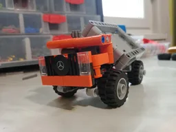 Mini dump truck with a 3 way tipper