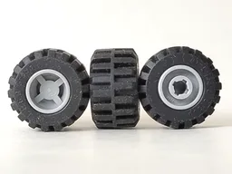 Wheel 11mm D. x 12mm, Hole Notched for Wheels Holder Pin with Black Tire 21mm D. x 12mm - Offset Tread Small Wide, Band Around Center of Tread (6014b / 87697) / Light Bluish Gray