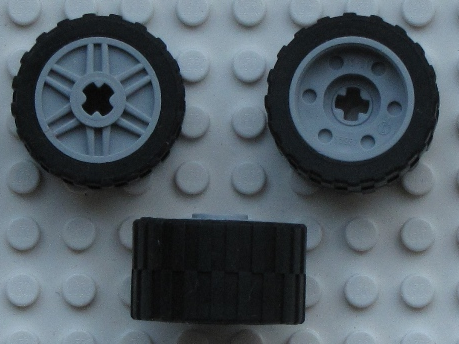 Lego Wheel 18mm D. x 14mm with Axle Hole, Fake Bolts and Shallow Spokes with Black Tire 24 x 14 Shallow Tread (55982 / 30648)