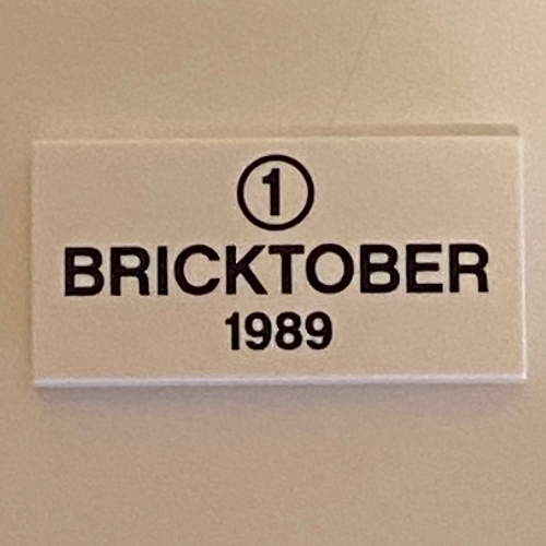 Lego Tile 2 x 4 with '1' in Circle, 'BRICKTOBER 1989' print / White