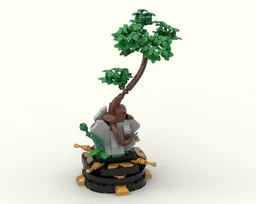 Bonsai on a rock in a black pot with gold inserts