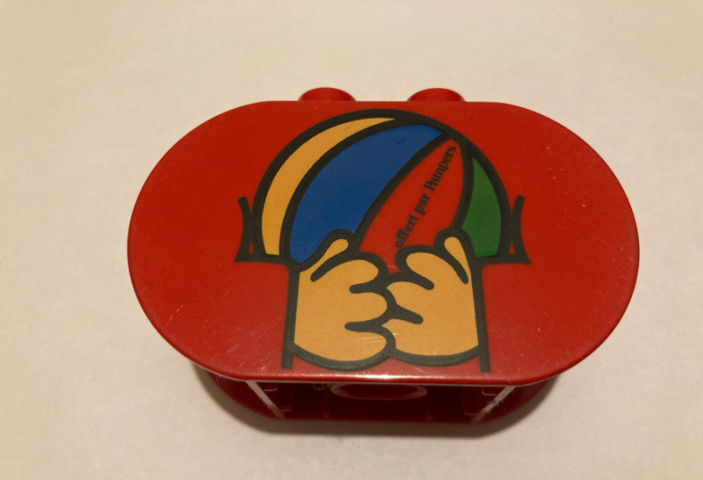 Lego Duplo, Brick 2 x 4 x 2 Rounded Ends with Hands Holding Ball with 'offert par Pampers' Pattern