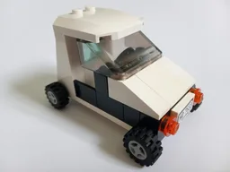 Small white and black car