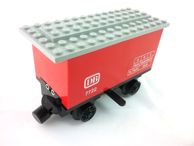 Lego Train Battery Box Car with Three Contact Holes, Black Switch Lever, Black Magnets, Black Wheels, and Light Gray Roof with 'DB 7722' Pattern on Both Sides (Stickers) - Set 7722