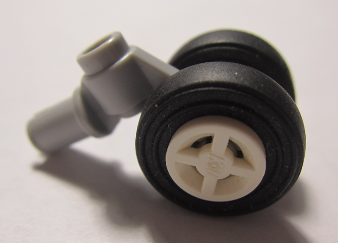 Lego Technic Pin with Dual Wheels Holder with White Wheels and Black Tires (61483 / 4624 / 59895)