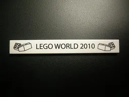 Tile 1 x 8 with 'LEGO WORLD 2010' and Bricks Pattern