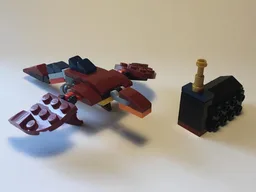 31102 Dragon with Building