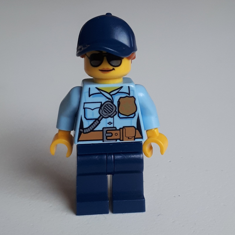 Lego Policewoman Sam Solo, Bright Light Blue Shirt with Radio and Badge, Dark Blue Legs, Dark Blue Cap with Hair, Sunglasses