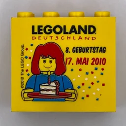 Brick 2 x 4 x 3 with 'LEGOLAND Deutschland Resort 8. Geburtstag 17. Mai 2010' Print / Yellow