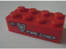 Brick 2 x 4 with White 'FIRE CHIEF' and Silver Badge Pattern Model Left Side (Sticker) - Set 8154