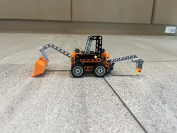 Backhoe With Auger